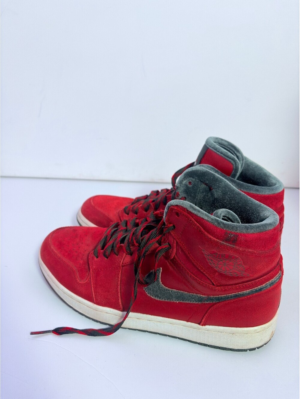 Nike Air Jordan red high top sneakers